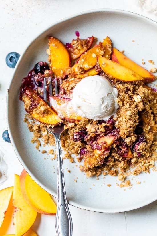 Blueberry Peach Crisp with a skoop of ice cream