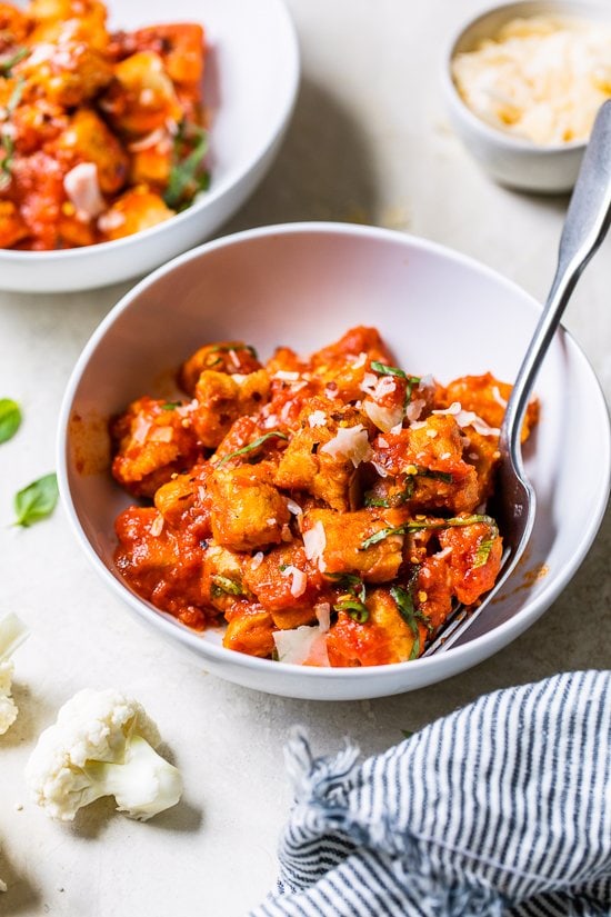 Cauliflower Gnocchi in a bowl with a fork.