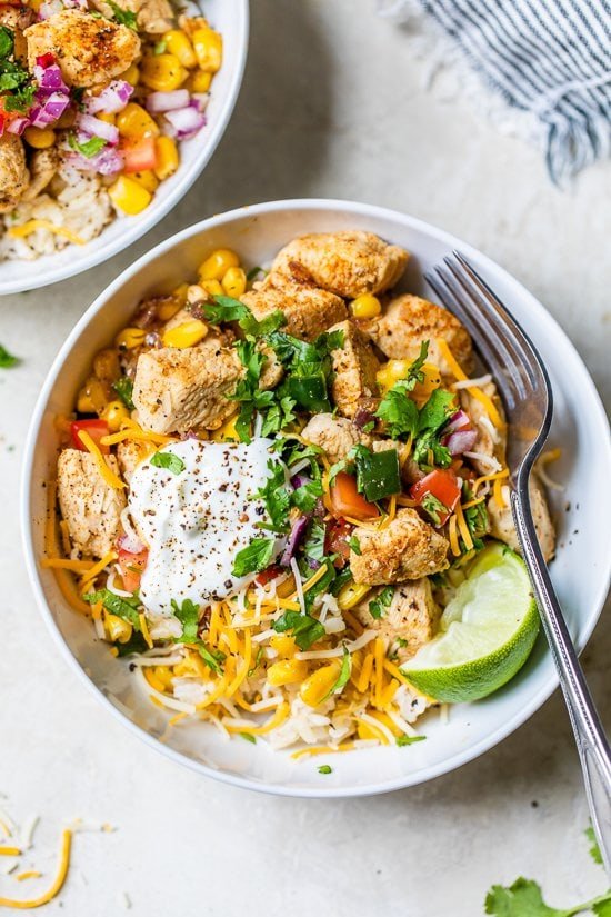 Chicken Taco Poblano Rice Bowls with a fork.
