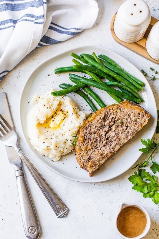 Meatloaf and Gravy with mashed potatoes and green beans.