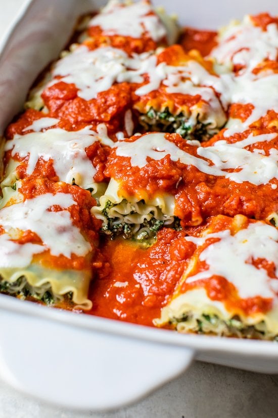 Mushroom Kale Lasagna Rolls in a baking pan.