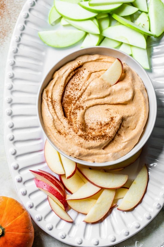 Pumpkin Pie Dip with sliced apples.